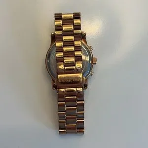 rose gold michael korda watch. Watches Inspired by the Biggest Blockbusters of the Summer  main image 4